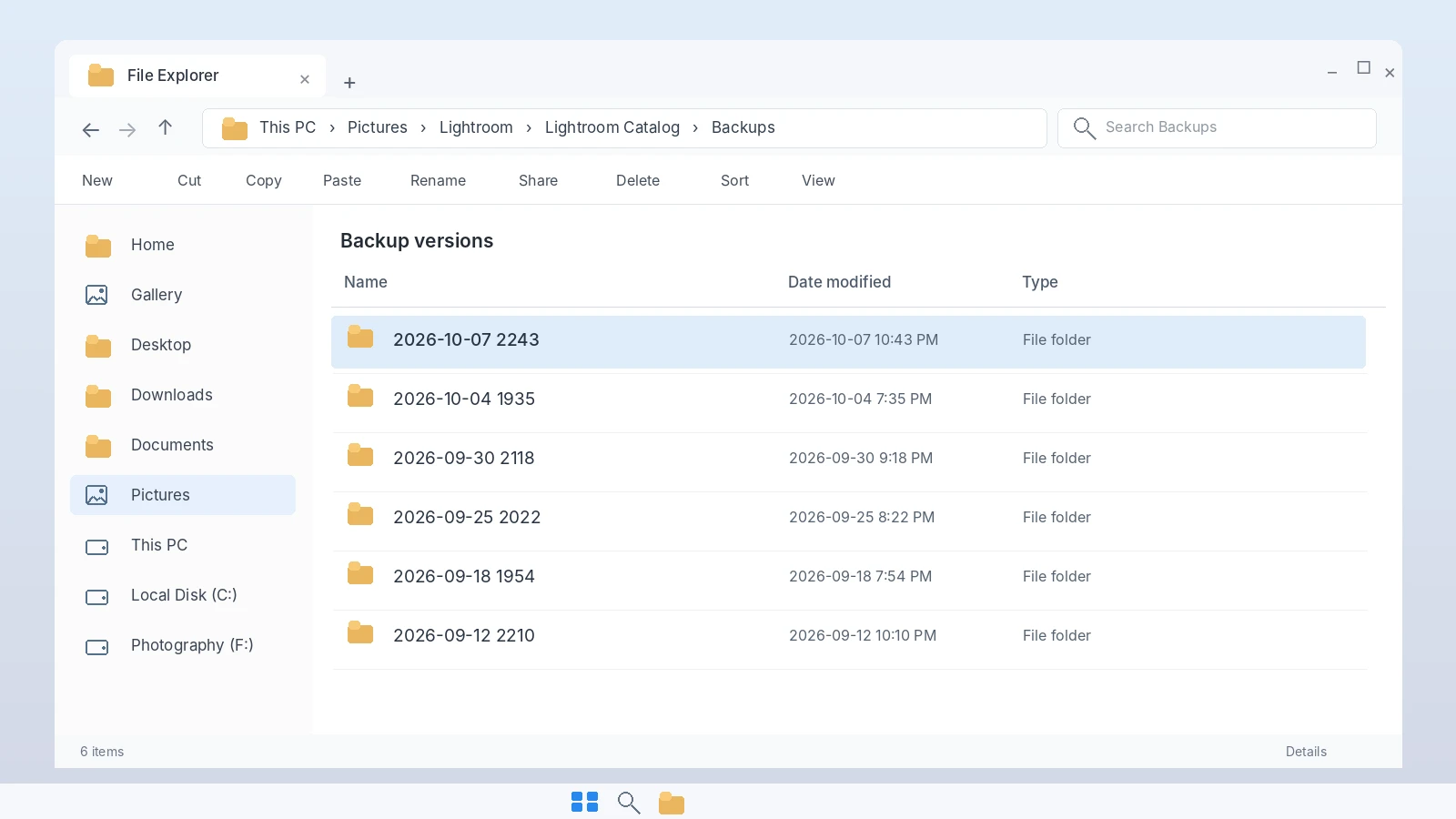 Lightroom-Classic-catalog-backup-files-in-Windows-11-File-Explorer-with-backup-dates