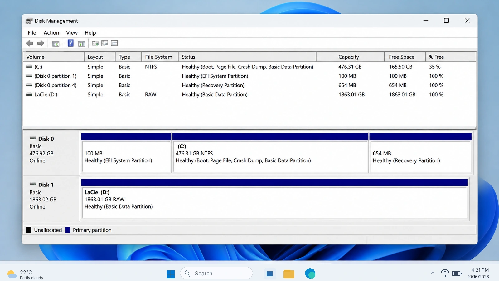 Windows 11 Disk Management showing a LaCie external drive with a RAW partition
